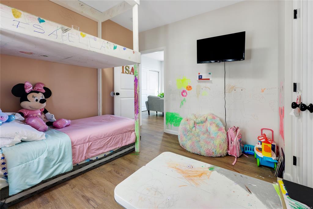 5-13 Academy Street Poughkeepsie, NY 12601 - Photo 7 of 11 Bedroom featuring wood-type flooring