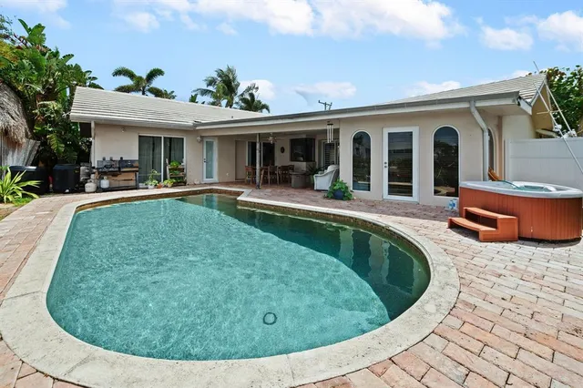 a view of a swimming pool with a garden