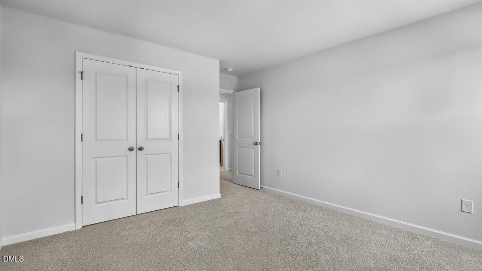 7589 Percussion Drive Apex, NC 27539 - Photo 19 of 33 a view of an empty room