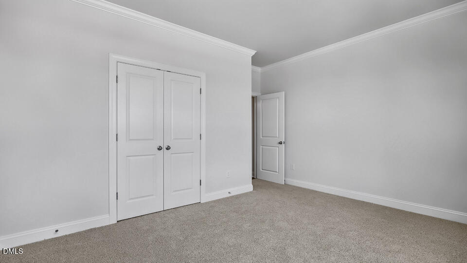 7589 Percussion Drive Apex, NC 27539 - Photo 21 of 33 a view of an empty room