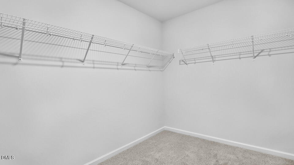 7589 Percussion Drive Apex, NC 27539 - Photo 29 of 33 a view of a room with racks on the wall