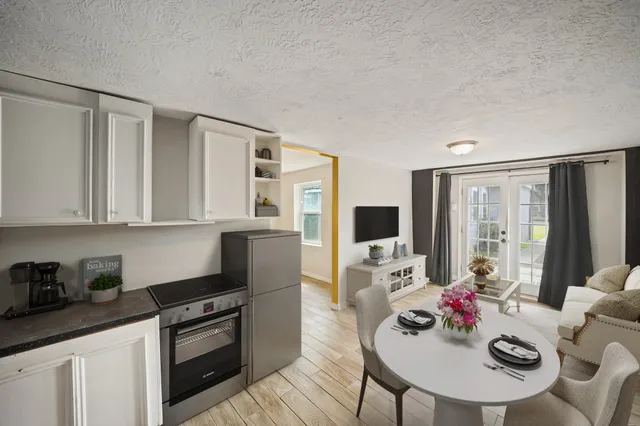 a view of a backyard with a sitting area