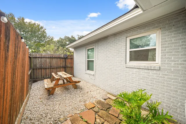 a front view of a house with patio
