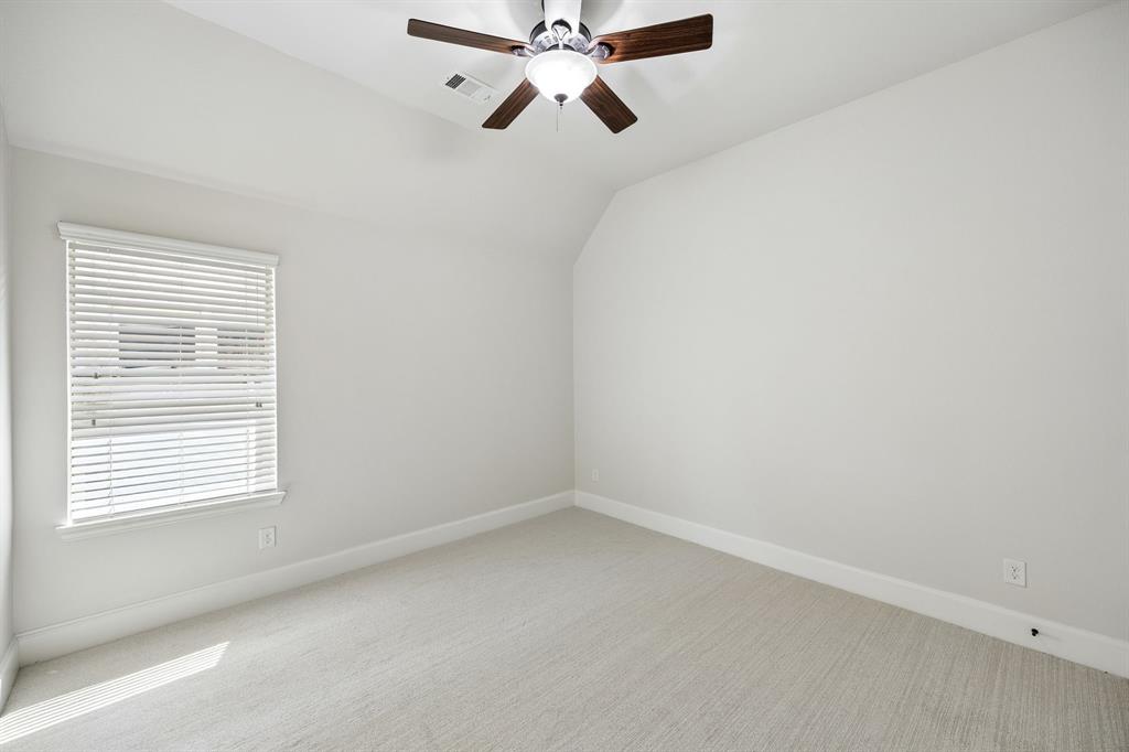 1567 Red Rock Canyon Road Frisco, TX 75036 - Photo 25 of 36 Secondary bedroom with fan with lightkit and new carpet