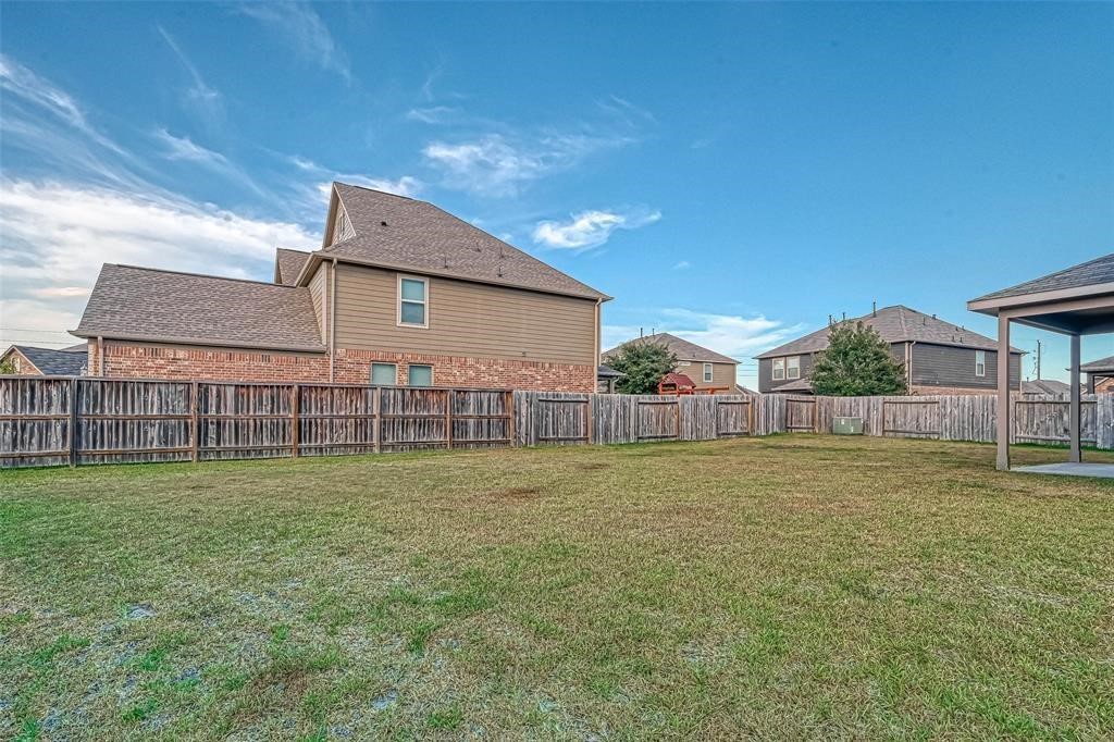 2561 Magnolia Fair Way Spring, TX 77386 - Photo 34 of 35 a house view with a outdoor space