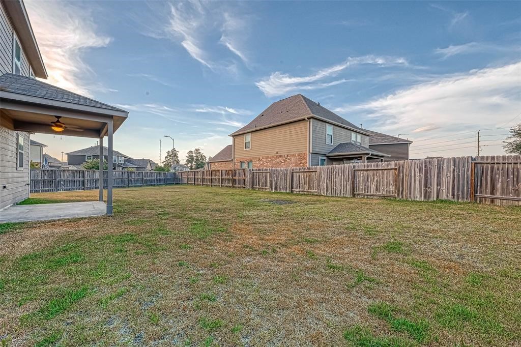 2561 Magnolia Fair Way Spring, TX 77386 - Photo 35 of 35 a view of a backyard