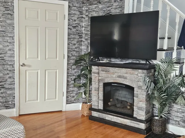 a living room with a fireplace