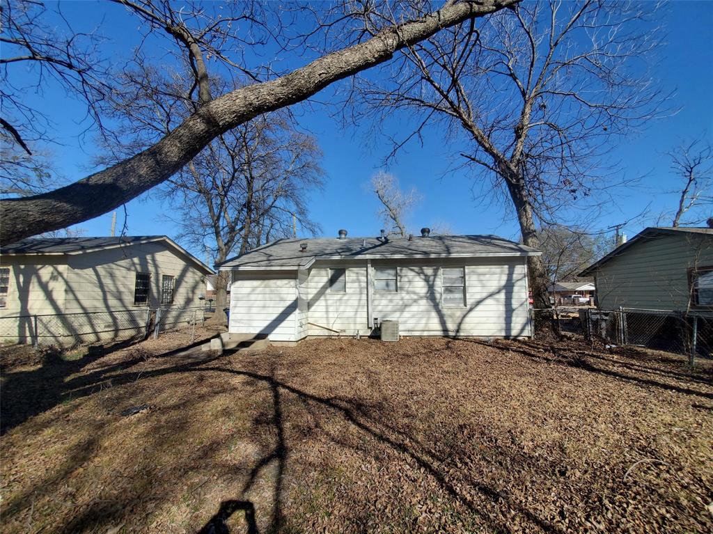 8706 Cardella Avenue Dallas, TX 75217 - Photo 3 of 8 a view of a backyard