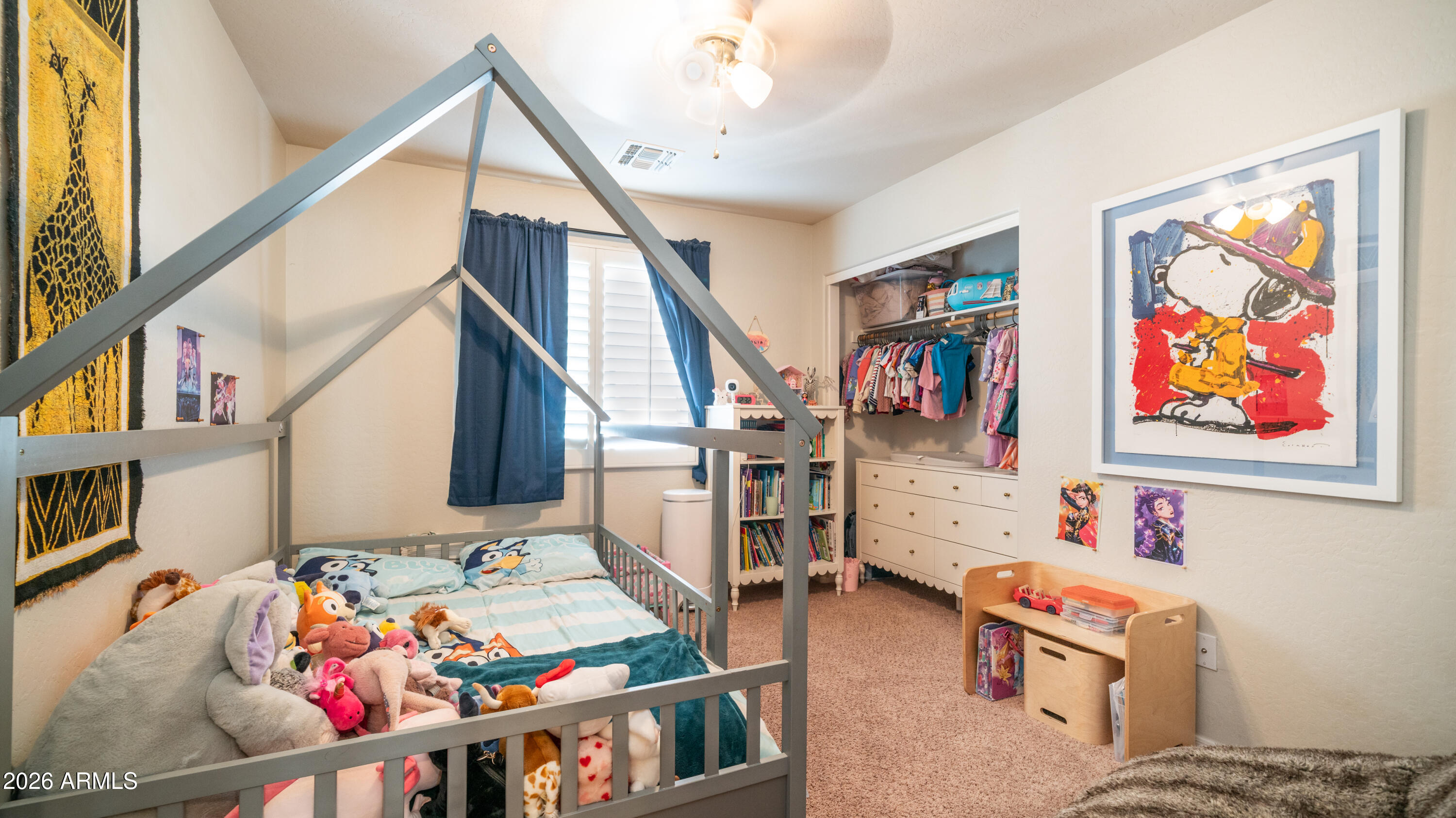 7609 South 18th Way Phoenix, AZ 85042 - Photo 23 of 32 a children room with furniture and toys