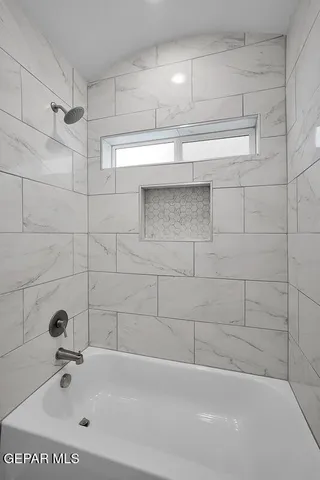 a bathroom with a bathtub