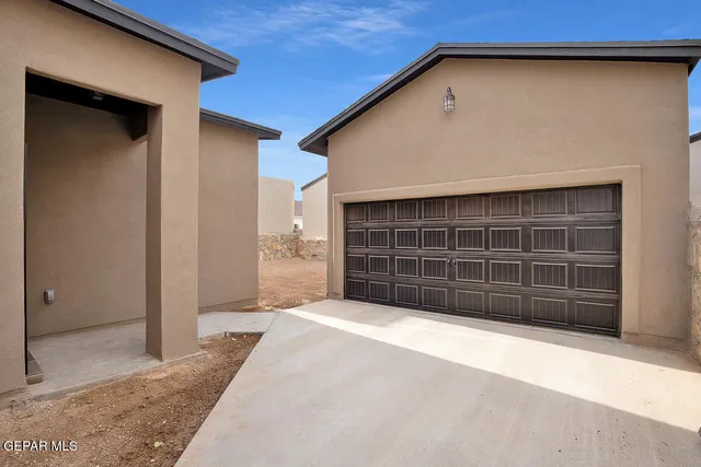 a view of a house with a large door