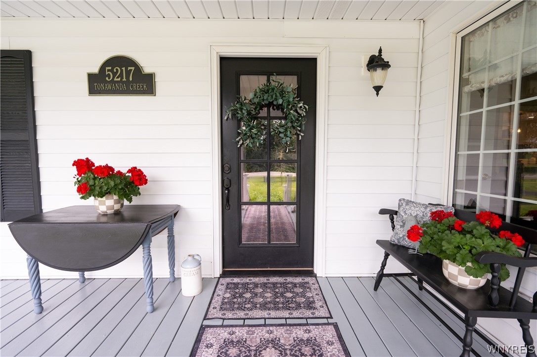 5217 Tonawanda Creek Road Pendleton, NY 14120 - Photo 2 of 50 Front entry under covered porch