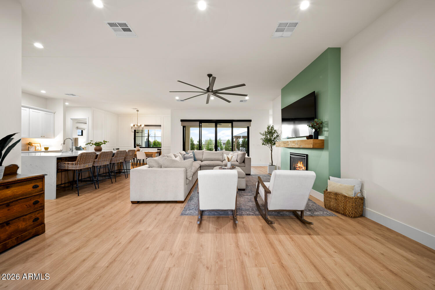590 South Sun Road Apache Junction, AZ 85119 - Photo 12 of 68 a living room with furniture and a flat screen tv