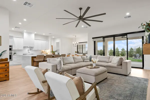 a stove top oven sitting inside of a kitchen