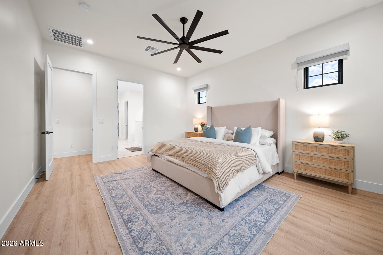 590 South Sun Road Apache Junction, AZ 85119 - Photo 28 of 68 a bedroom with a bed and a dresser