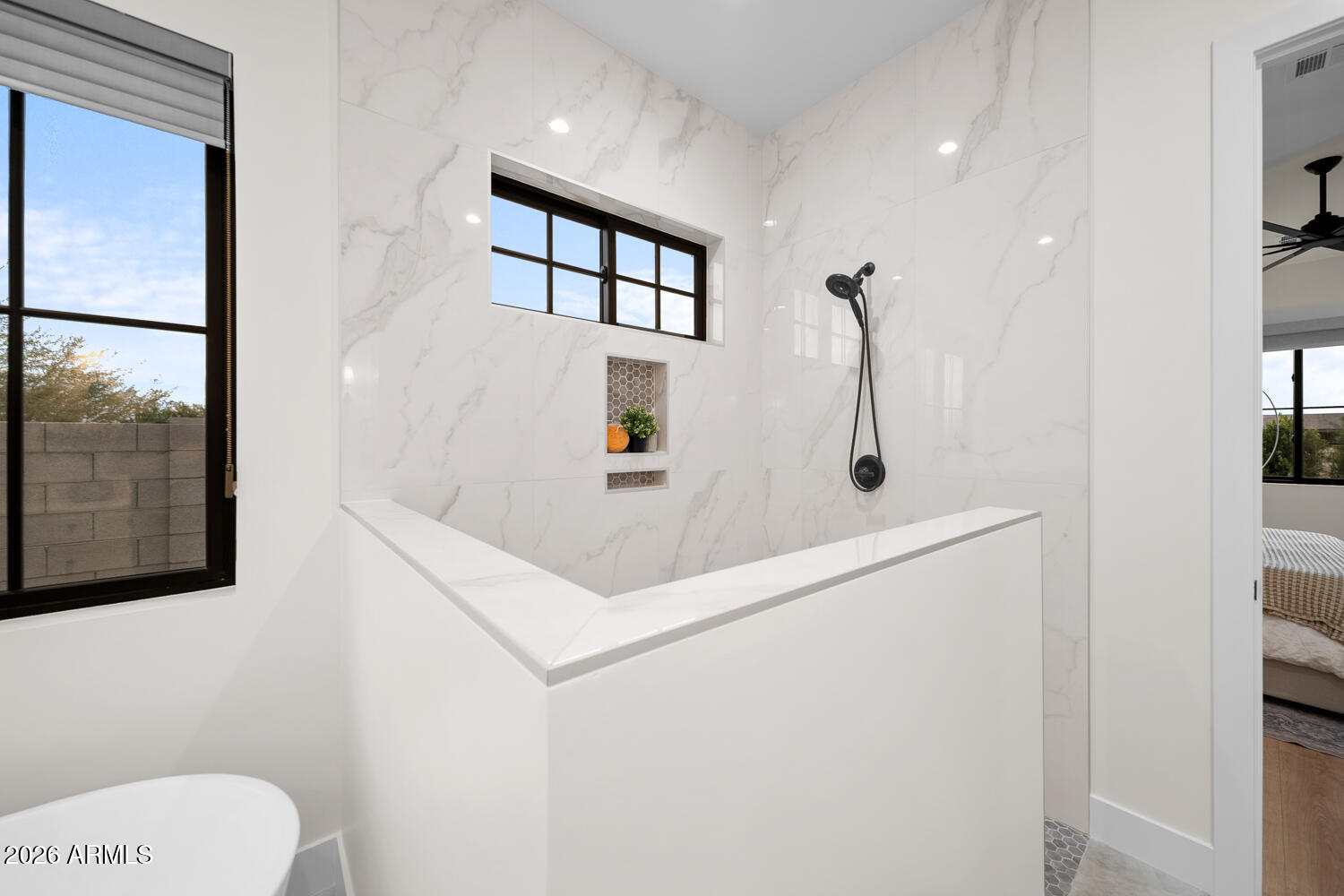 590 South Sun Road Apache Junction, AZ 85119 - Photo 33 of 68 a bathroom with a sink a toilet and shower