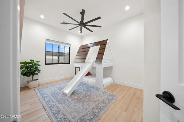 a view of a house with a yard and garage