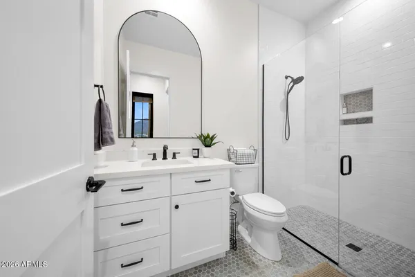 a patio with table and chairs