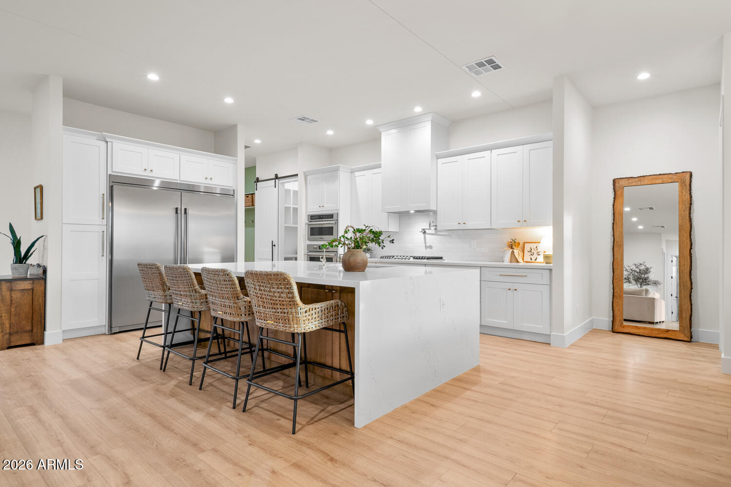 590 South Sun Road Apache Junction, AZ 85119 - Photo 4 of 68 a kitchen with a table chairs refrigerator and microwave