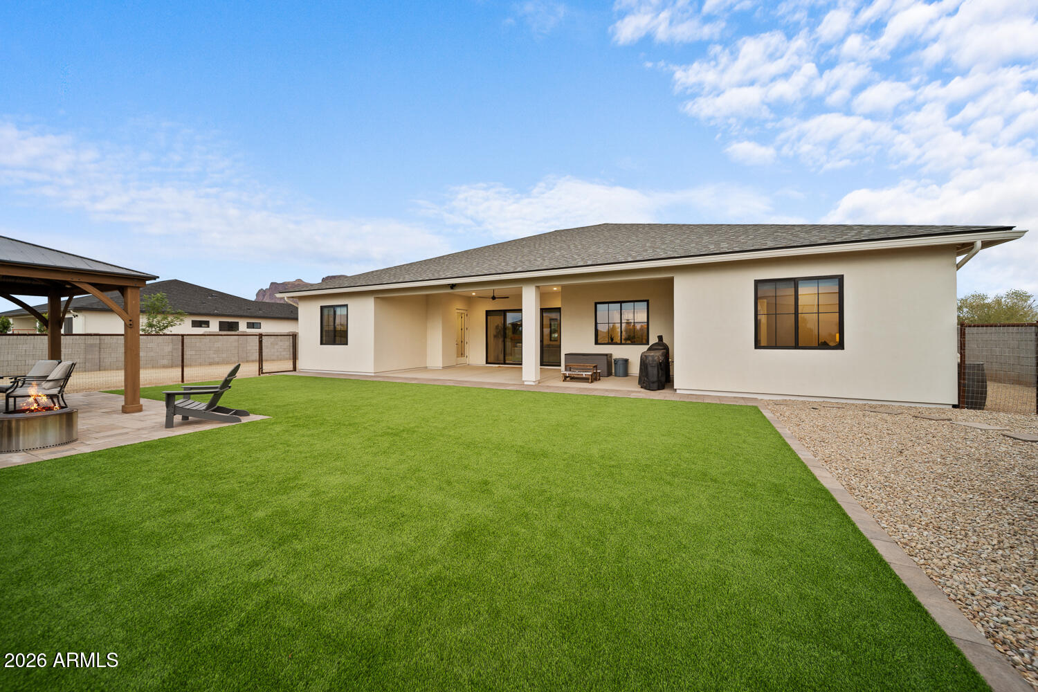 590 South Sun Road Apache Junction, AZ 85119 - Photo 53 of 68 a front view of house with yard and green space