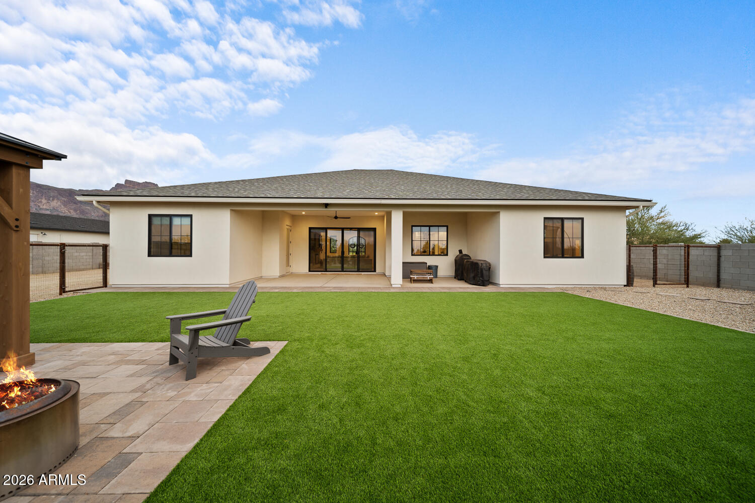 590 South Sun Road Apache Junction, AZ 85119 - Photo 54 of 68 a view of a house with backyard and sitting area