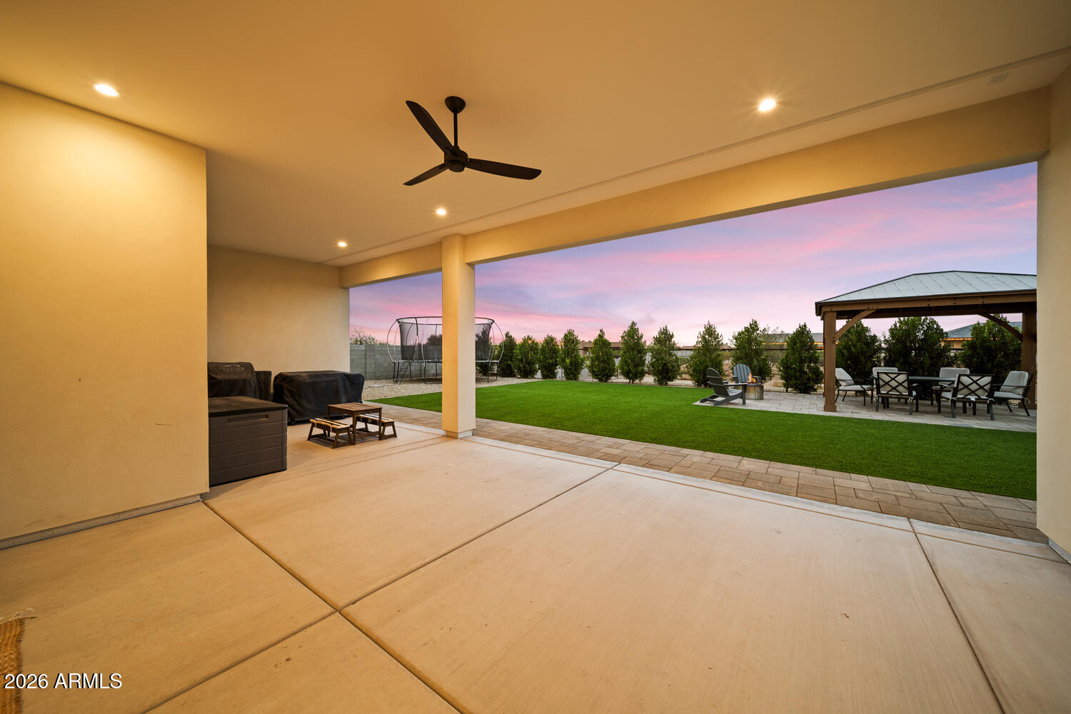 590 South Sun Road Apache Junction, AZ 85119 - Photo 55 of 68 a view of a patio with a table and chairs