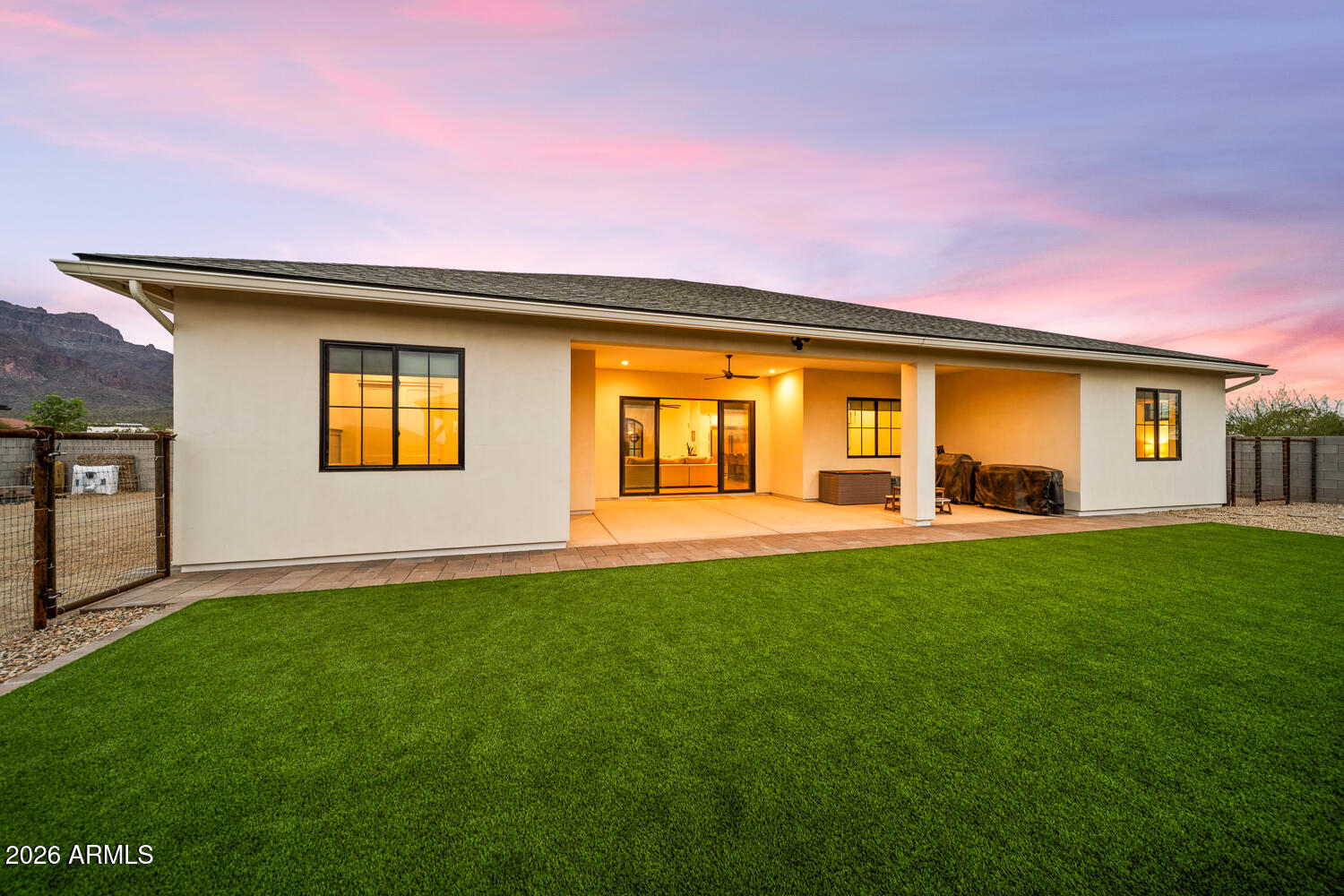 590 South Sun Road Apache Junction, AZ 85119 - Photo 59 of 68 a front view of a house with a yard