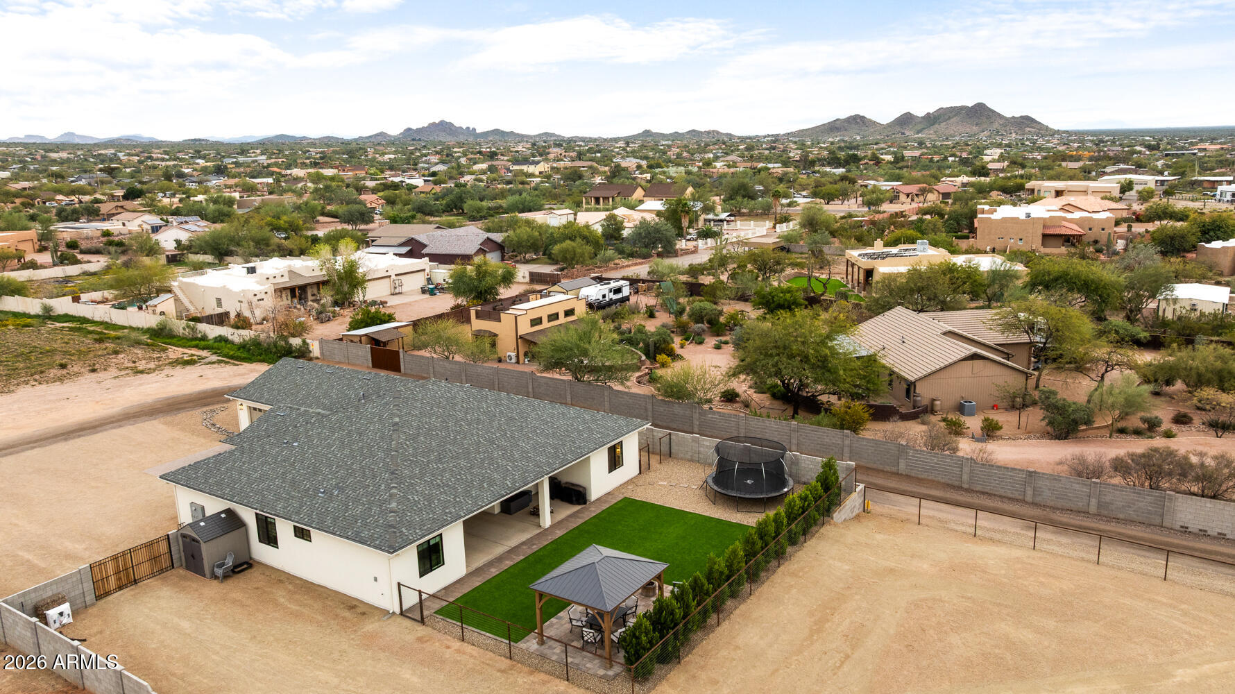 590 South Sun Road Apache Junction, AZ 85119 - Photo 66 of 68 an aerial view of residential houses with city view