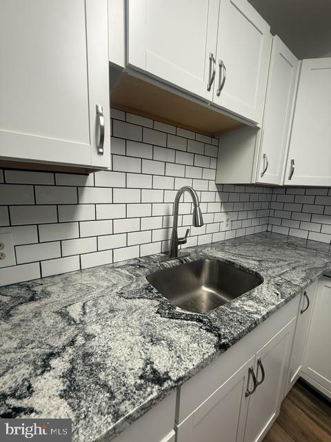77 Cardinal Road Levittown, PA 19057 - Photo 9 of 37 a kitchen with a sink and cabinets