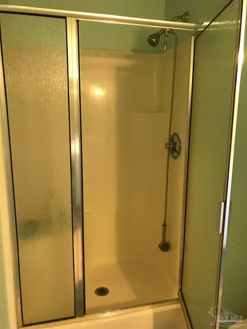 a kitchen with a cabinets and appliances