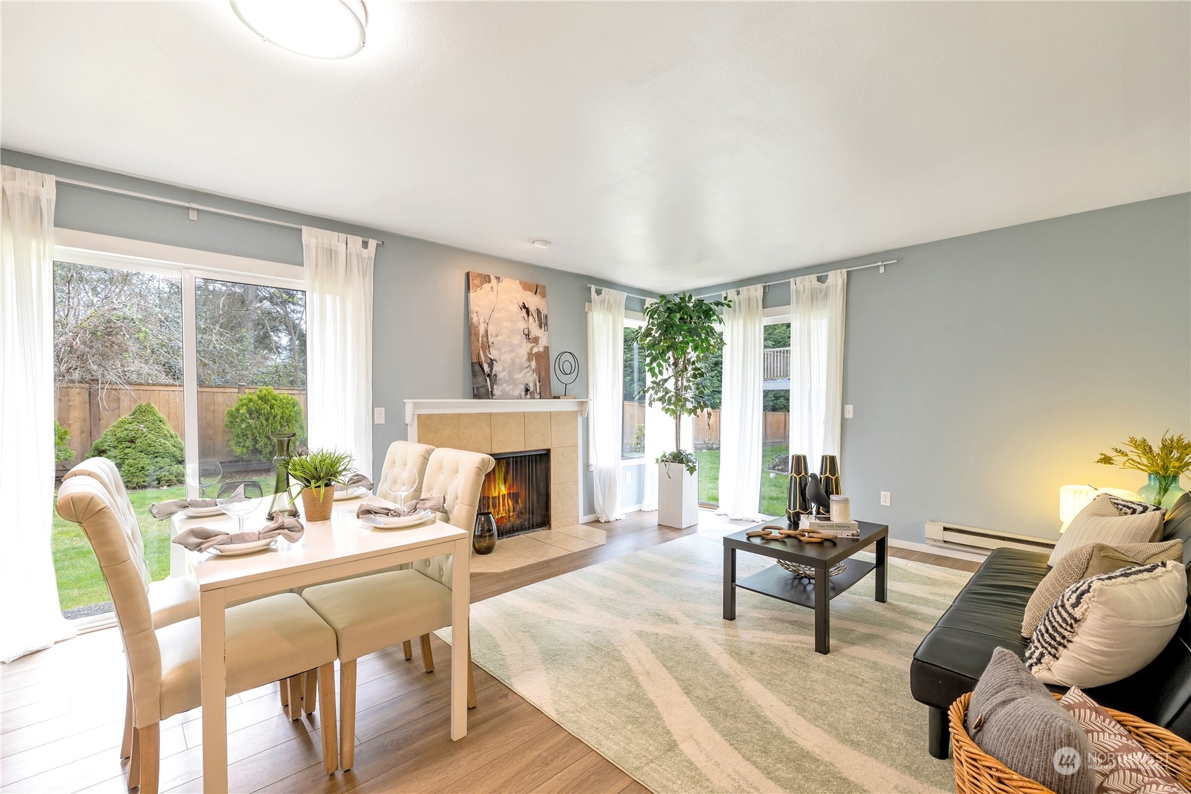 14401 Southeast Petrovitsky Road, Unit B101 Renton, WA 98058 - Photo 1 of 22 a living room with furniture and a fireplace