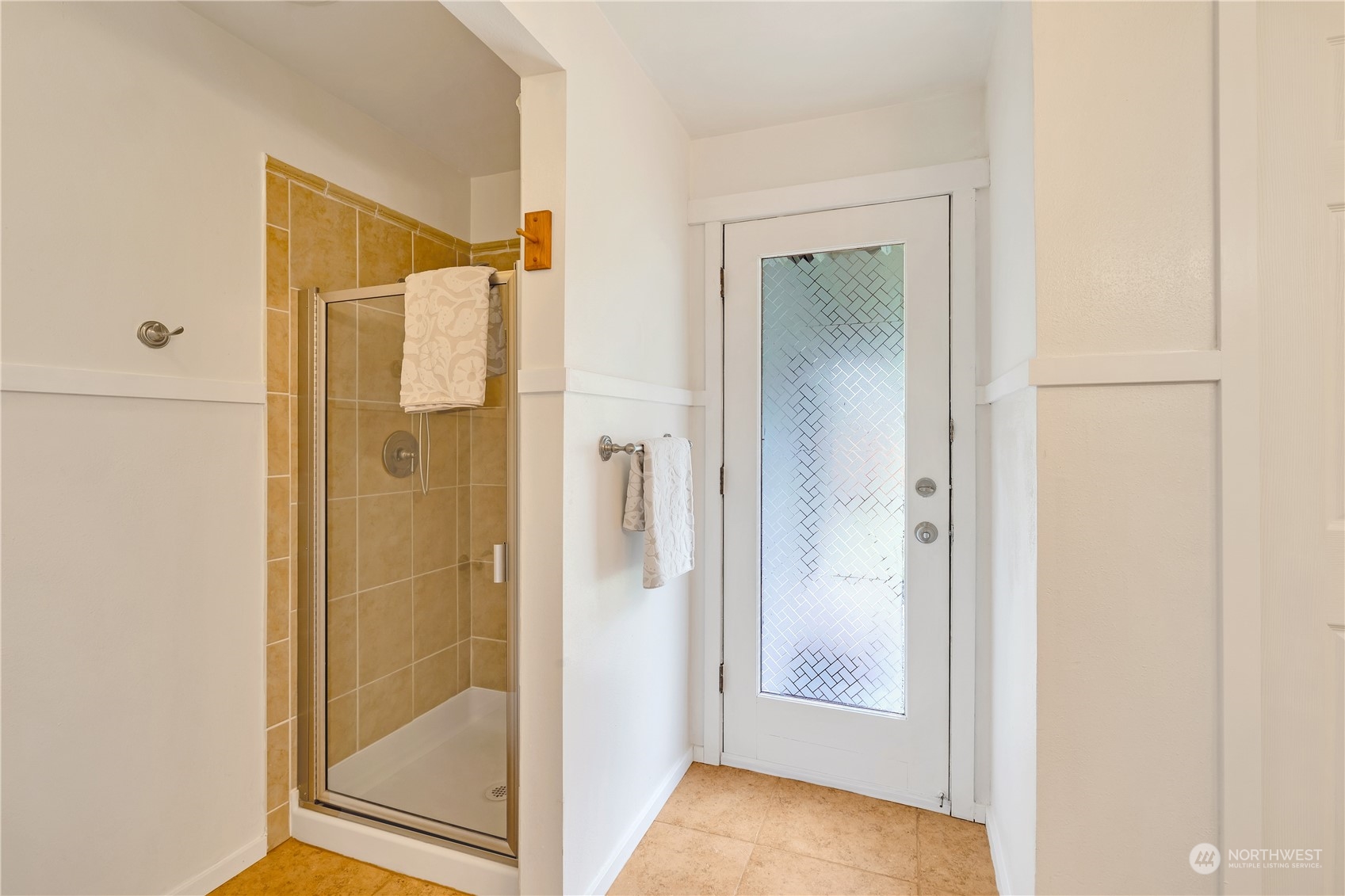 14401 Southeast Petrovitsky Road, Unit B101 Renton, WA 98058 - Photo 17 of 22 a view of a bathroom from a hallway