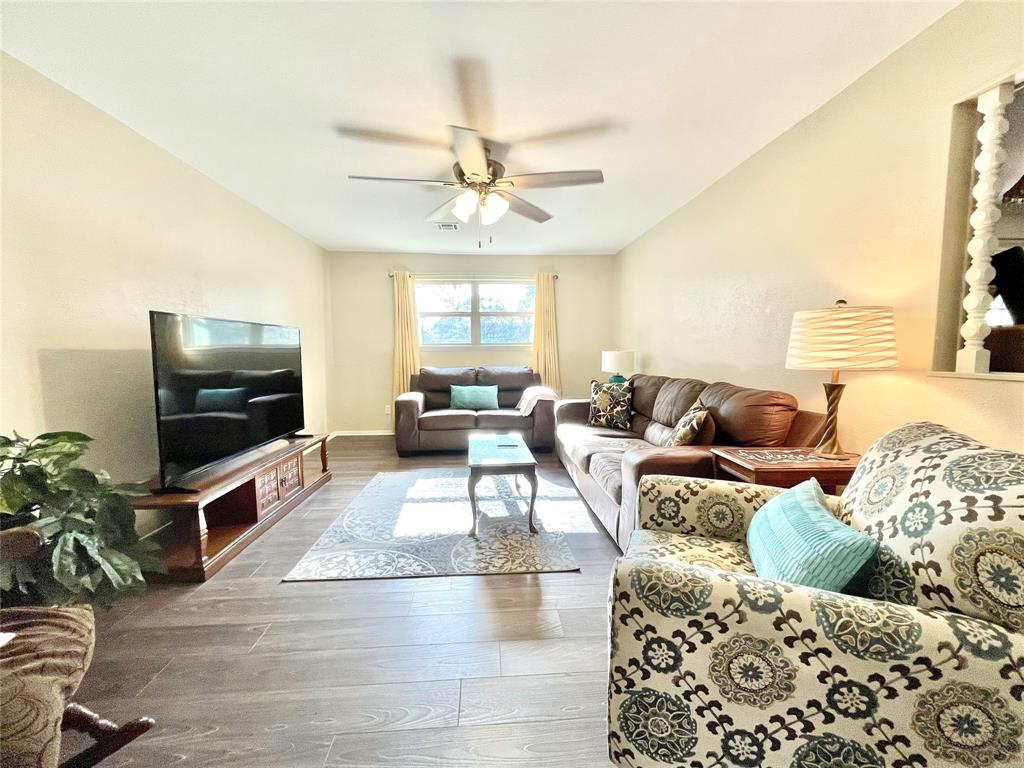 945 Brickyard Road West, TX 76691 - Photo 12 of 25 a living room with furniture and a flat screen tv