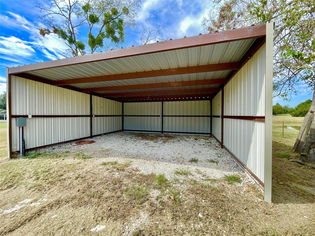 945 Brickyard Road West, TX 76691 - Photo 22 of 25 a view of backyard with wooden fence