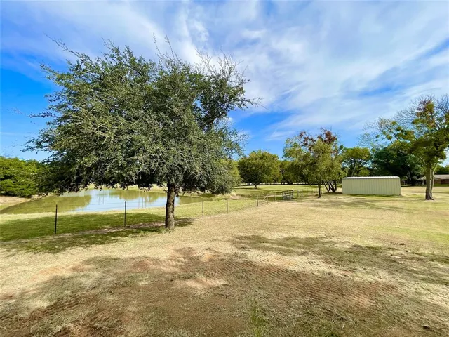 a view of an outdoor space and swimming pool