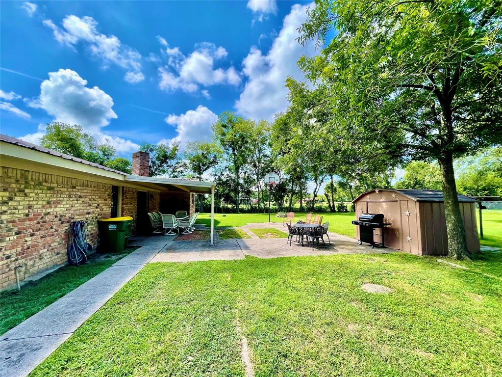 945 Brickyard Road West, TX 76691 - Photo 4 of 25 a view of a house with backyard porch and sitting area
