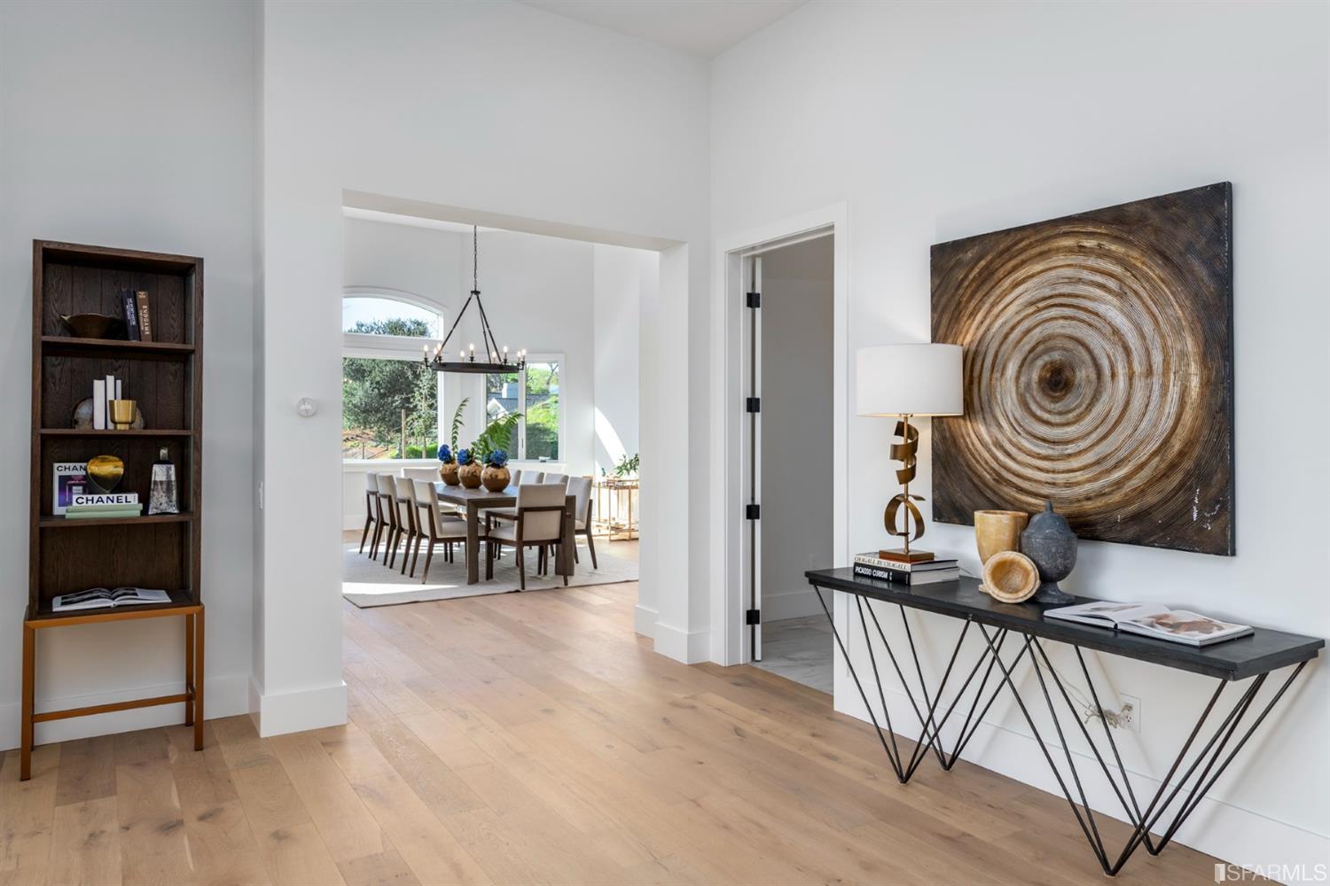 5 Winding Oaks Drive Pleasanton, CA 94566 - Photo 17 of 72 a dining room with furniture a rug and a chandelier