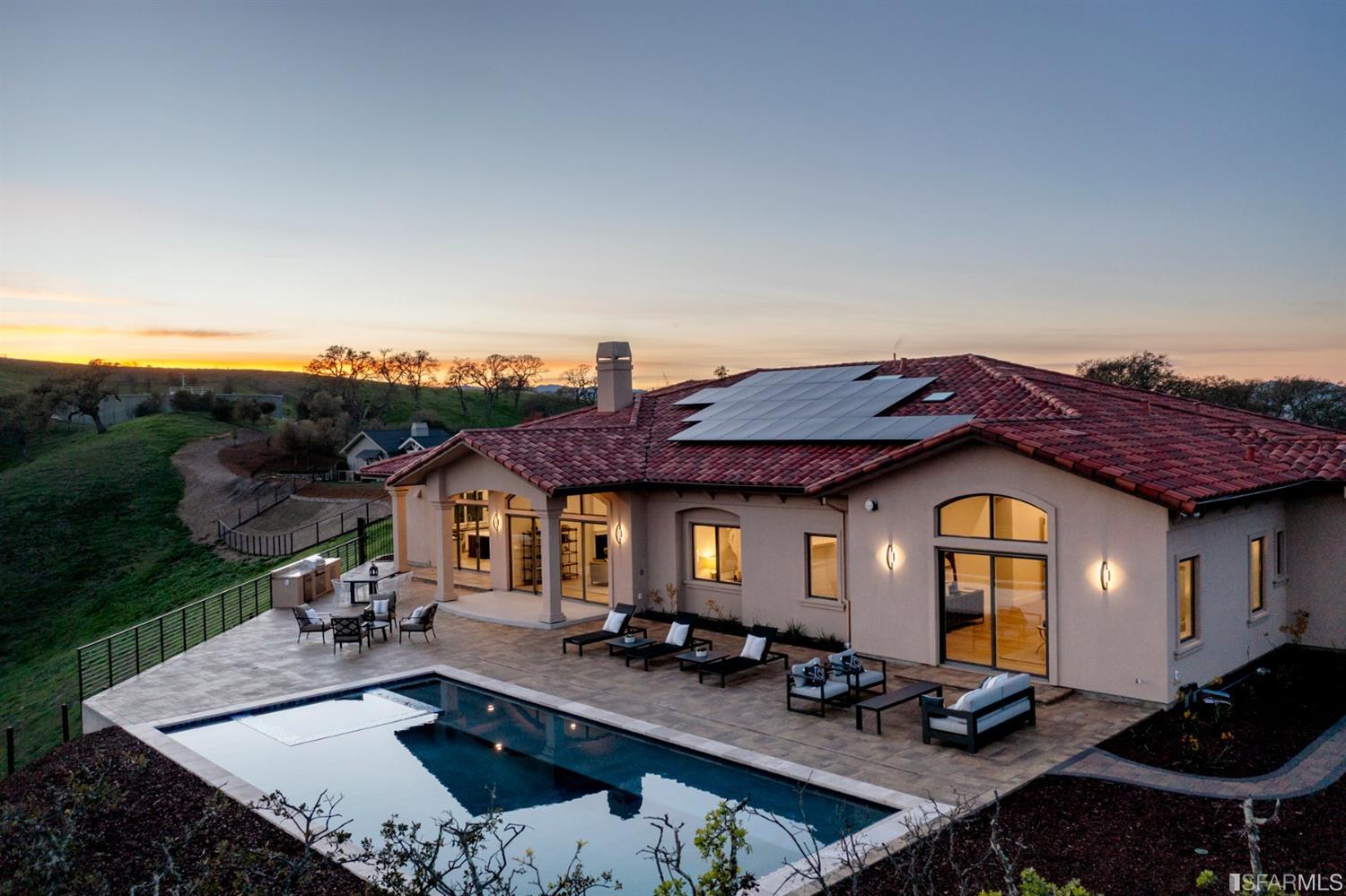 5 Winding Oaks Drive Pleasanton, CA 94566 - Photo 2 of 72 a view of a chairs and table in a backyard
