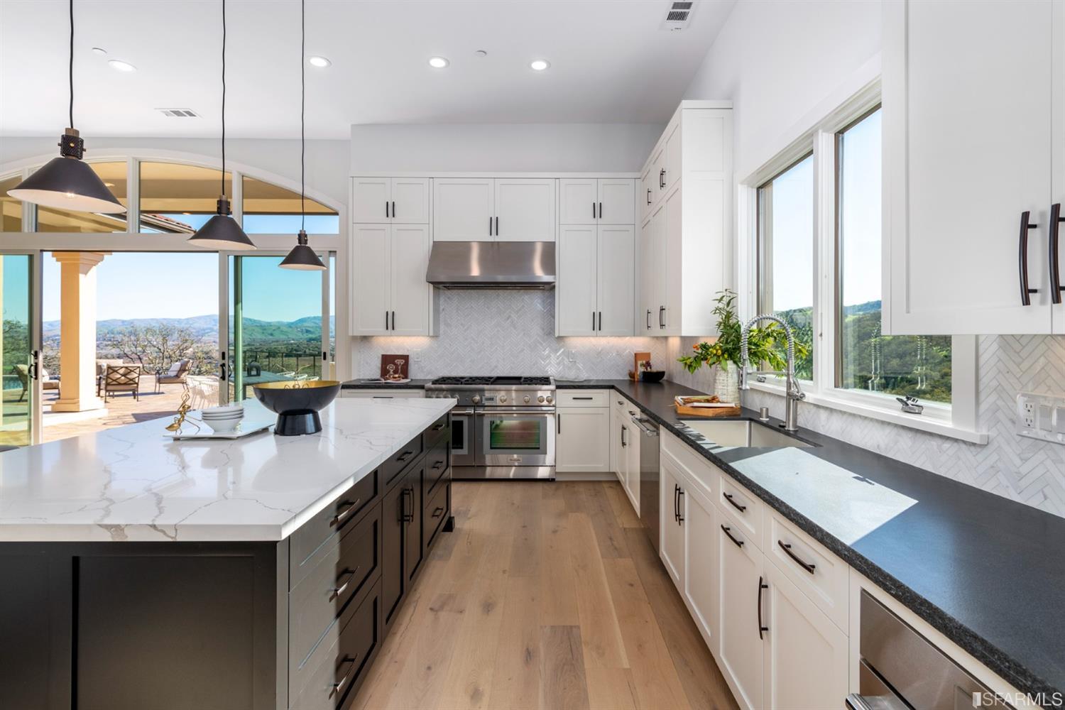 5 Winding Oaks Drive Pleasanton, CA 94566 - Photo 25 of 72 a kitchen with stainless steel appliances granite countertop sink stove and large window