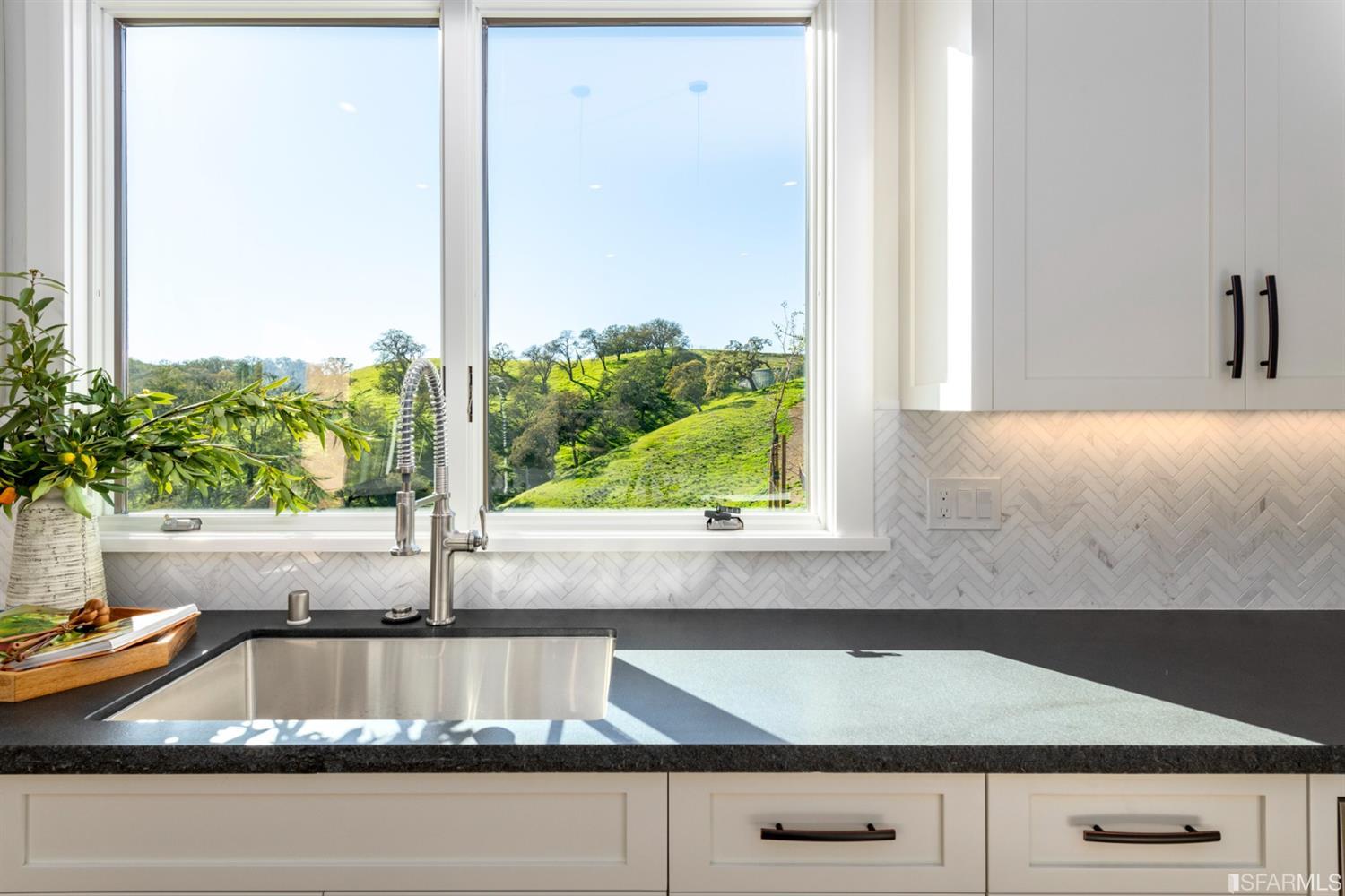 5 Winding Oaks Drive Pleasanton, CA 94566 - Photo 26 of 72 a kitchen with granite countertop a sink and a window