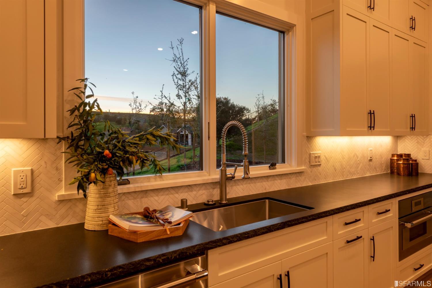 5 Winding Oaks Drive Pleasanton, CA 94566 - Photo 30 of 72 a kitchen with a sink and large window