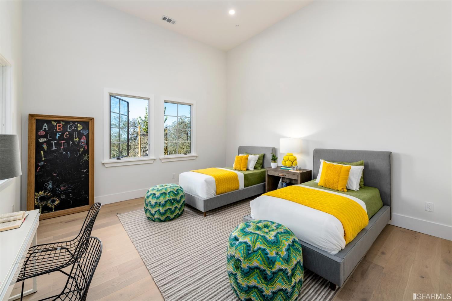 5 Winding Oaks Drive Pleasanton, CA 94566 - Photo 46 of 72 a bedroom with two beds and a couch