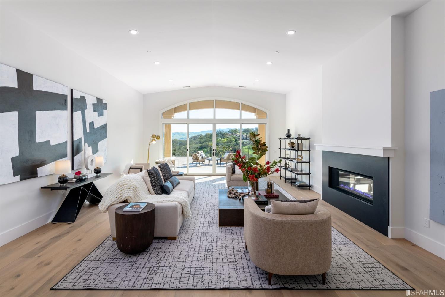 5 Winding Oaks Drive Pleasanton, CA 94566 - Photo 10 of 72 a living room with furniture and a fireplace