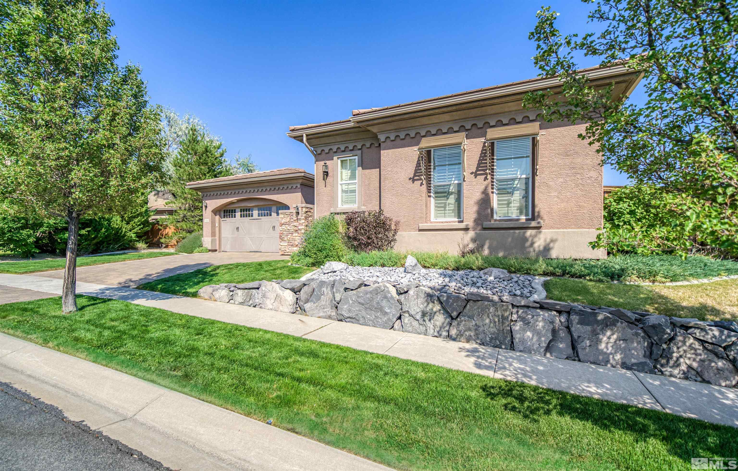 1816 Laurel Ridge Drive Reno, NV 89523 - Photo 3 of 40 a front view of a house with garden