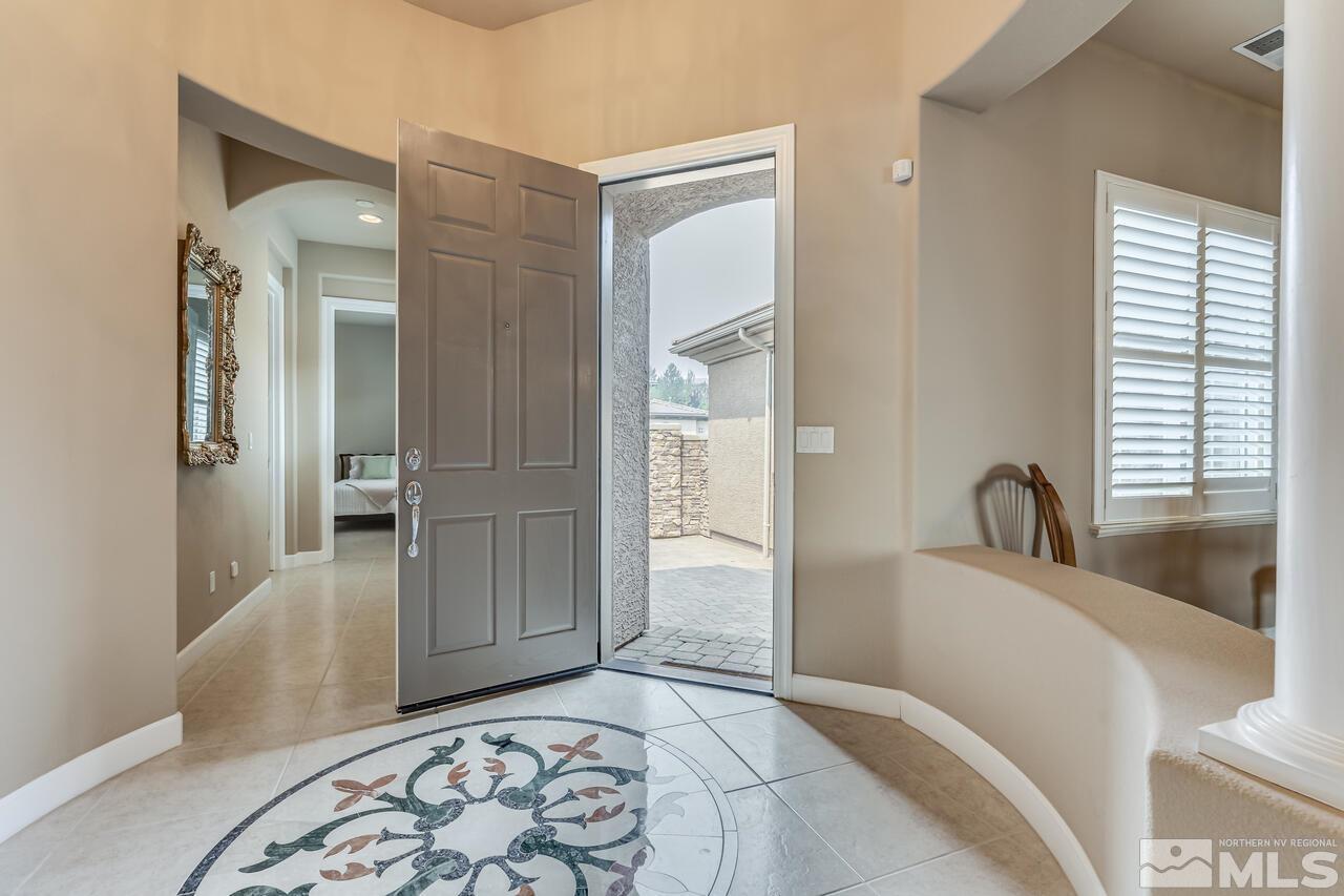 1816 Laurel Ridge Drive Reno, NV 89523 - Photo 5 of 40 a bedroom with a bed and a rug