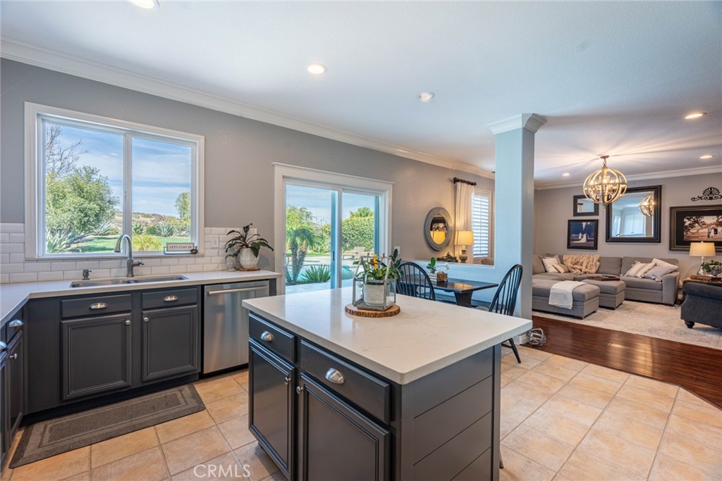 28201 Springvale Lane Castaic, CA 91384 - Photo 11 of 59 Kitchen with sliding glass door to backyard.
