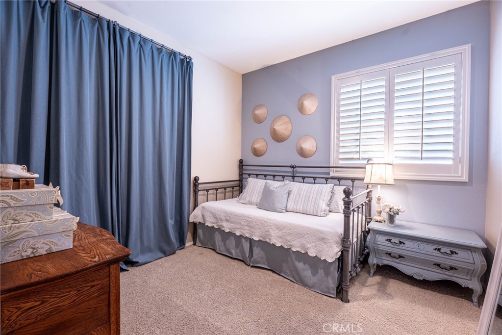 28201 Springvale Lane Castaic, CA 91384 - Photo 13 of 59 a bedroom with a bed and a window