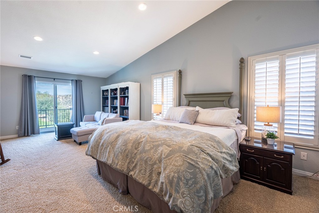 28201 Springvale Lane Castaic, CA 91384 - Photo 16 of 59 a bed room with a bed and a couch