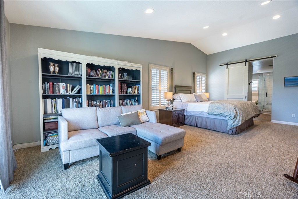28201 Springvale Lane Castaic, CA 91384 - Photo 17 of 59 a living room with furniture and a book shelf