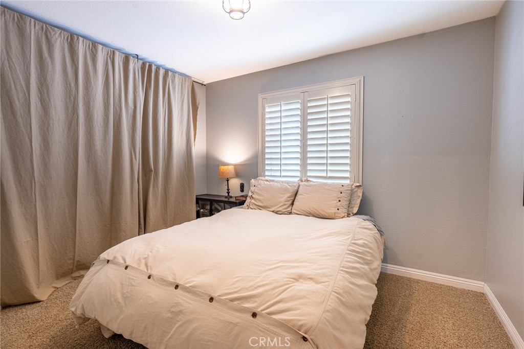 28201 Springvale Lane Castaic, CA 91384 - Photo 23 of 59 a large white bed in a room